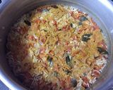A picture of step 4 of Tomato coconut rice.