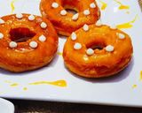 A picture of step 9 of Orange Glaze doughnut.