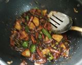 A picture of step 2 of Veg fried pulav.