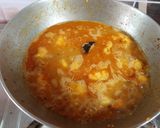 A picture of step 5 of Chingri Moong Daal.
