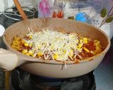 A picture of step 4 of Maggi Corn Pizza.