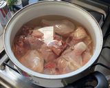 A picture of step 1 of Chicken Soup.