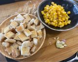 A picture of step 1 of Homemade croutons and sweet corn toppings 🌽.