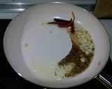 A picture of step 7 of Moogdal with spinach.