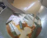 A picture of step 8 of Drumstick masala curry.
