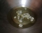 A picture of step 2 of Fry Mash Daal.
