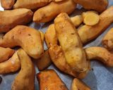 A picture of step 1 of Fresh Turmeric and Garlic Pickle.