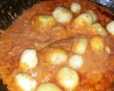 A picture of step 11 of Kashmiri dum aalo.