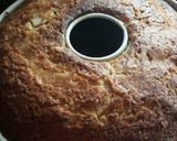 A picture of step 11 of Apple bundt cake with flaked almonds.