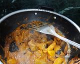 A picture of step 6 of Brinjal potato curry.