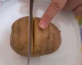 A picture of step 2 of Hasselback Potatoes.