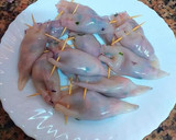 Foto del paso 7 de la receta: Chipirones frescos rellenos en salsa de cebolla y tikka curry