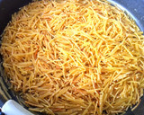 Foto del paso 2 de la receta: Fideuá negra de calamar