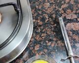A picture of step 1 of Turmeric Cardamom Milk.