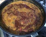 Une image de l'étape 16 de Dahl de lentilles jaunes aux carottes violettes, tomates et courgette.