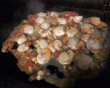 Une image de l'étape 7 de Noix de saint Jacques à l'ail, tomate et citron confit.