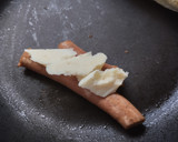 Foto del paso 5 de la receta: Perrito caliente🌭con aguacate🥑🧀y salsa tártara🥯