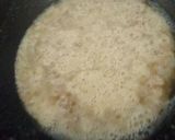 A picture of step 2 of Suji ka Dane dar halwa.