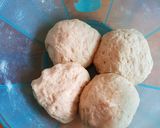 A picture of step 8 of Crunchy soft Mandazi with cinammon and orange rind.
