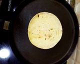A picture of step 2 of Rotli stuffed with Jibno and Mint Jibna Feta cheese Sudan.