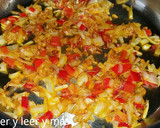 Foto del paso 3 de la receta: Arroz meloso de cebolla y bacalao