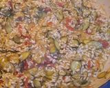 A picture of step 4 of Spanish Saffron Risotto with Zucchini and Sundried Tomatoes.
