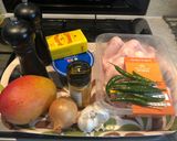 A picture of step 1 of Murgi’r aam kasundi - Chicken in mango mustard.