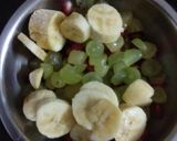 A picture of step 2 of Grapes pomegranate banana custard.