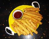 A picture of step 6 of Spicy Rava Fries.