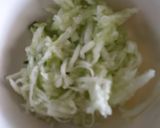 A picture of step 1 of Carrot and cucumber raita.
