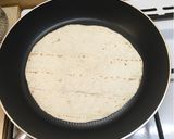 A picture of step 2 of Banana peanut butter tortilla.