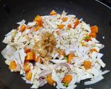 A picture of step 3 of Thai style fried rice with vegetables and tofu.