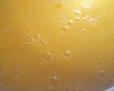 A picture of step 1 of Orange Popsicle Treat.