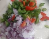 A picture of step 3 of Flatten rice chilla.