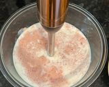 A picture of step 4 of Strawberry banana smoothie using a hand blender.