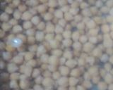 A picture of step 2 of Safaid Chana boil.