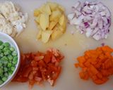 A picture of step 1 of Healthy Mixed Veg Khichdi.