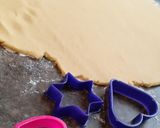A picture of step 3 of Edible Christmas tree décor; stained glass windows biscuits.