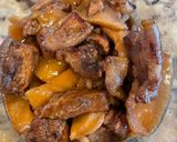 A picture of step 3 of Braised Pork with Young Coconut.