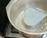 A picture of step 3 of 3 color cream cake.