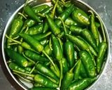 A picture of step 1 of Green chilli pickle.
