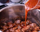 A picture of step 4 of Instant Pot Beef Mechado.