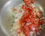 A picture of step 3 of Sweet and sour Tomato Curry serve with white rice.