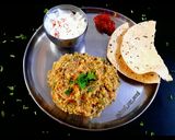 A picture of step 4 of Vegetable Daliya Khichdi.