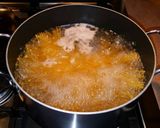 A picture of step 10 of Mike's EZ Seafood Alfredo & Roasted Garlic Spread Dinner.