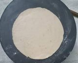 A picture of step 4 of Shankh/ conch shaped layered paratha.