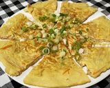 A picture of step 16 of Enoki Mushroom Omelette.