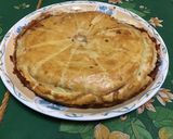 Une image de l'étape 15 de Tourte au munster, oignon, cumin et vin blanc.