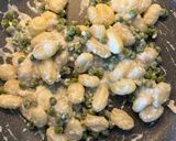 Foto del passaggio 2 della ricetta Gnocchi con ricotta,piselli e prosciutto