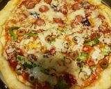 صورة لخطوة 8 من وصفة بيتزا محشيه بالاطراف طعمها بيشهي🍕